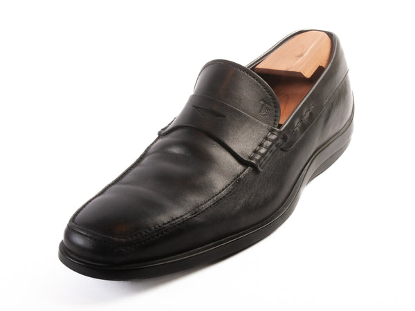 Tod’s Black Penny Loafers