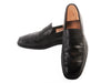 Tod’s Black Penny Loafers