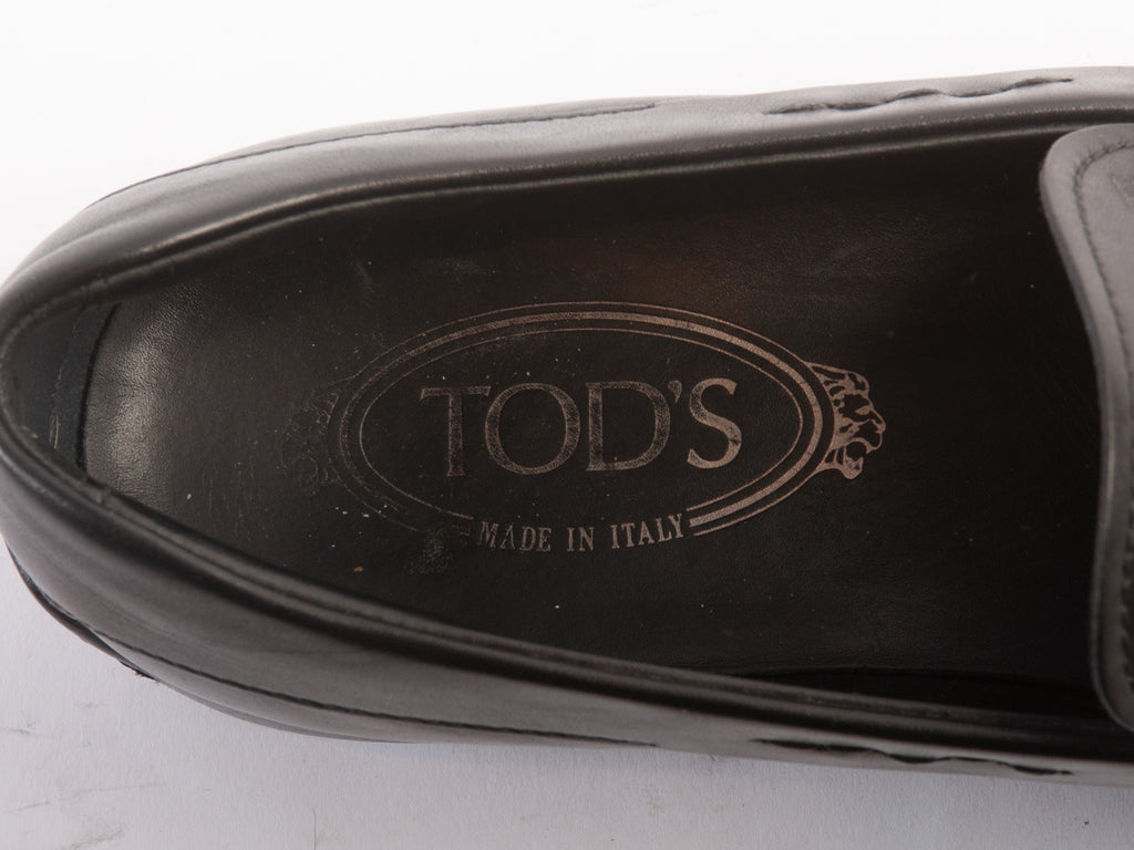 Tod’s Black Penny Loafers